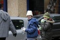 Sick children wear protective masks against flu virus walk on the street in Sofia, Bulgaria Ã¢â¬â nov 01, 2009